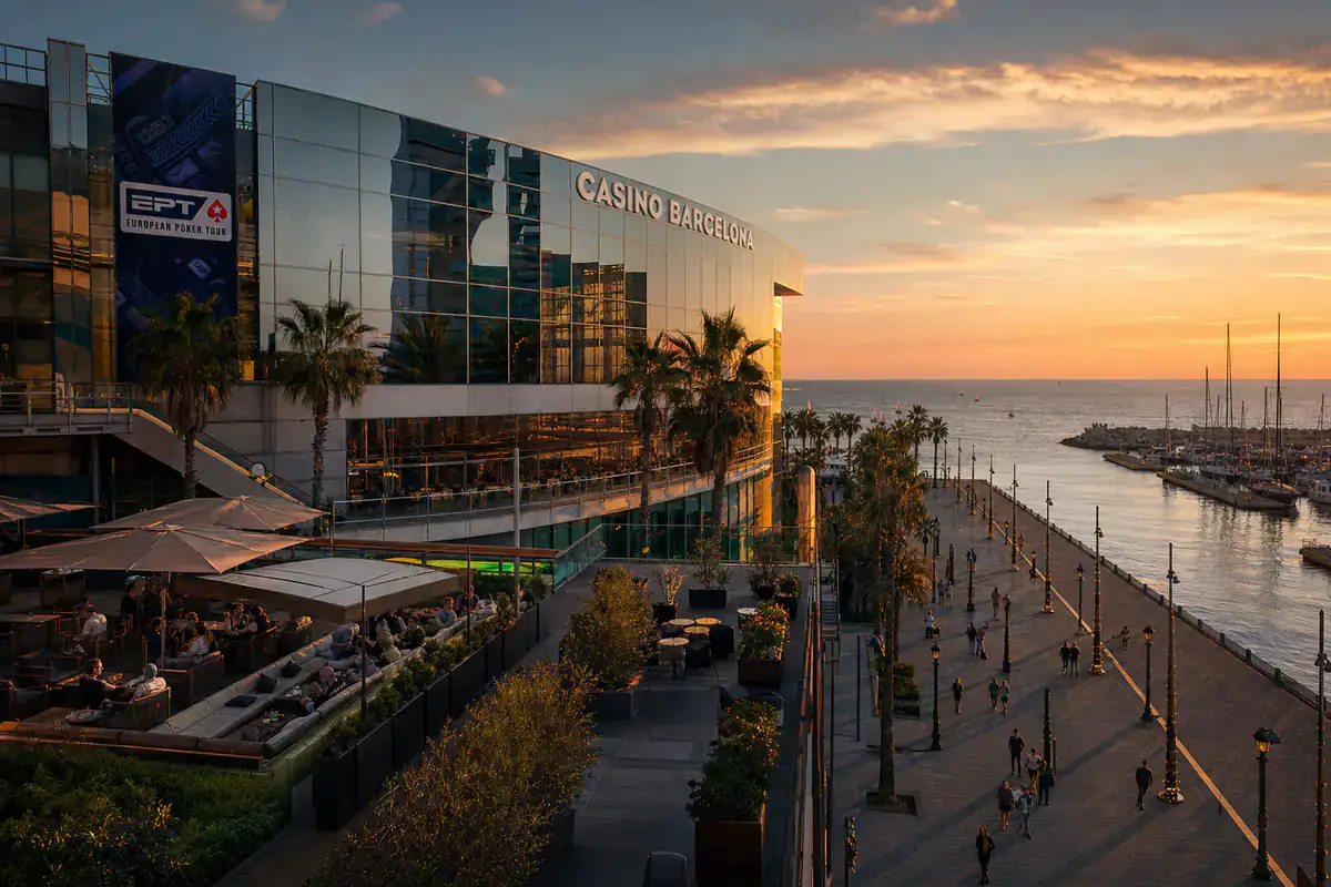 Casino Barcelona overlooking Port Olímpic at dusk with poker tournament banners — EPT Barcelona 2026