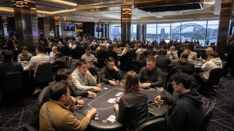 WPT Australia poker tables at The Star Sydney with Darling Harbour views — players competing in 2026 championship